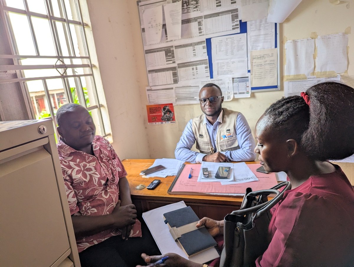 Melmo team with Parish Chief and Health Assistant Kasaali Town Council.jpg